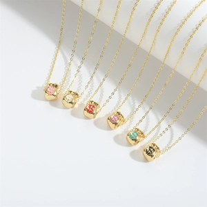 Minimalist gold money bag pendant necklaces with dollar symbols in six vibrant colors