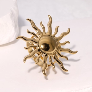 Elegant gold stainless steel sunflower ring with adjustable band on white stone