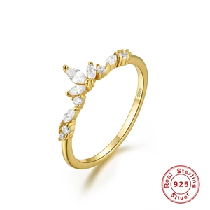 Macro shot of crown-shaped S925 sterling silver ring with marquise and round cubic zirconia