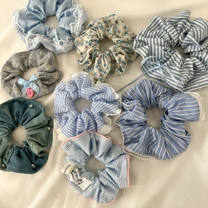 Set of 8 blue and white lace scrunchies in various floral and striped fabric patterns