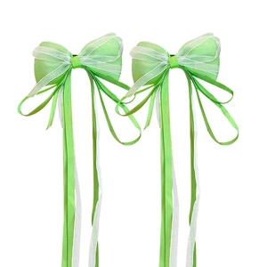Pair of green and white ribbon hair bows for girls hair accessories on white background