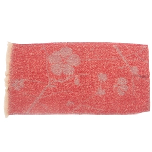Close-up of red jacquard flower scarf featuring soft wool texture and short tassels