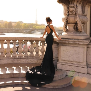 Elegant black halter evening gown with rhinestone neckline and open back mermaid tail