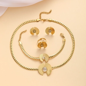 Elegant 4-piece gold titanium jewelry set with round cat eye stones for women