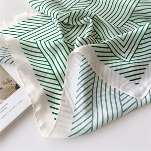 70cm square silk scarf featuring green geometric stripes on a white background