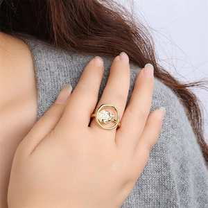 Irregular hollow geometric open ring in 18K gold finish on model's finger