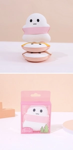 Detailed view of cartoon ghost marshmallow makeup puffs with their individual packaging