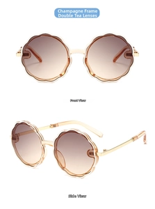Detail view of champagne flower frame kids sunglasses with gradient brown lenses and gold arms