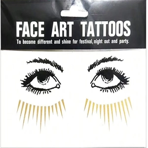 Detailed retail packaging for black and gold face art tattoos for parties and festivals