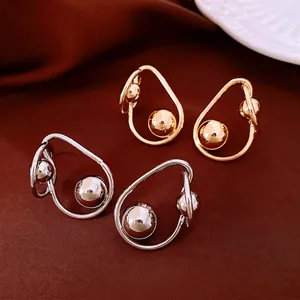 Boucles d'oreilles boules torsadées minimalistes en or et argent avec cadre goutte