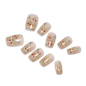 Faux ongles œil de chat nude avec motifs cerises et strass argentés pour femmes