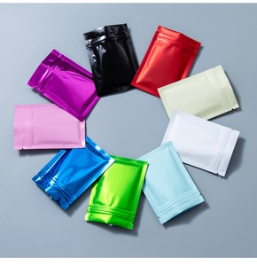Flat lay view of colorful aluminum foil resealable bags in nine metallic glossy finishes
