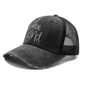 Distressed black denim baseball cap with mesh back featuring Be Kind heart print