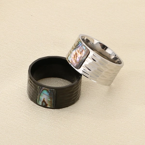 Hammered stainless steel ring set with shell inlay in black and silver finishes