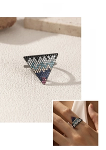 Close-up of S925 silver inverted triangle ring with colorful pavé micro zircons