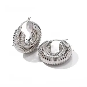 Detailed size view of silver textured hoop earrings featuring a shrimp-style ribbed design