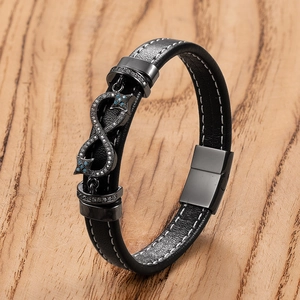 Men's leather bracelet with black infinity symbol and blue accents on wood background
