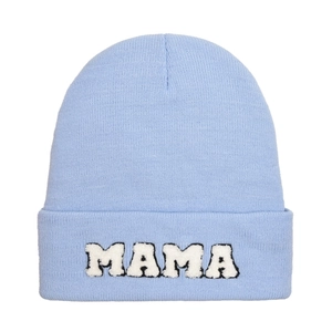 Detailed view of light blue knit beanie featuring MAMA towel embroidered lettering