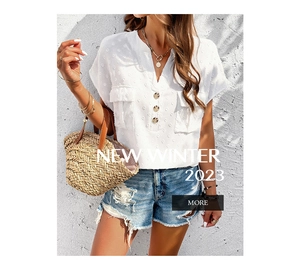 Detail of white V-neck blouse featuring Swiss Dot fabric texture and functional front pockets