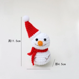 Handcrafted crochet snowman doll with red Christmas hat and scarf, cute holiday home decor.