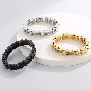 Detailed view of rock style bicycle chain bracelets in silver, black, and gold finishes