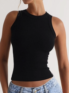 Close-up of black ribbed fabric texture and crew neck design on sleeveless crop top