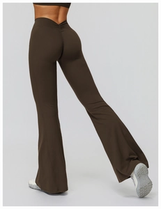 Detail view of high-waisted yoga flare pants showing back V-shaped ruched butt lift design