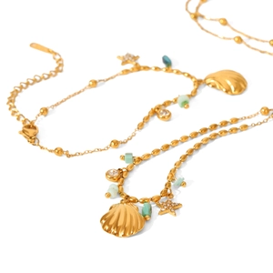Gold stainless steel layered shell and star pendant necklace with green beads