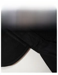 Detail of the moisture-wicking sweatband inside a wool winter baseball cap with fine stitching