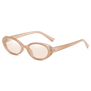Retro oval sunglasses with a translucent beige frame and brown lenses at a 45-degree angle