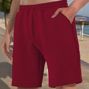 Men's dark red drawstring casual beach shorts with textured jacquard knit pattern