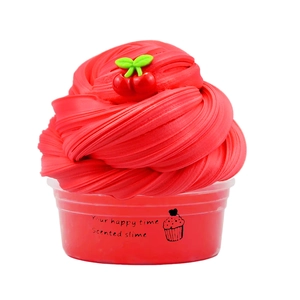 Red scented cherry slime in clear container with swirled foam texture for stress relief