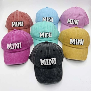 Multi-color washed cotton baseball caps featuring white plush MINI letter embroidery