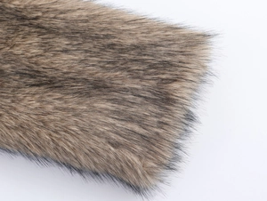 Detailed macro view of the brown and black faux fur texture on this oversized winter coat