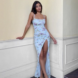 Floral backless slit midi dress with spaghetti straps and pleated details in light blue