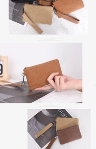 Detailed close-up of washed canvas coin purses in beige and brown with wrist straps