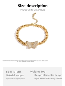 Close-up of gold Cuban chain bracelet with crystal butterfly pendant and 5cm extension