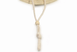 Detail of adjustable beige chin strap with toggle for western straw sun hat