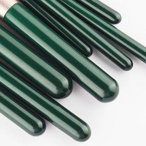 9-piece dark green makeup brush set with glitter handles and silver metal ferrules