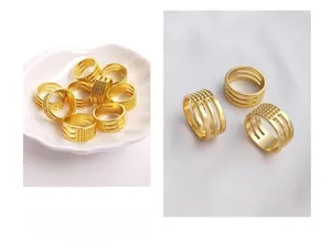 Detalle de anillos multicapa bañados en oro con diseños calados en bandeja de concha blanca