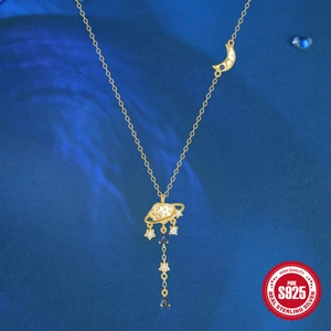 S925 sterling silver celestial necklace with moon, stars, and blue water drop pendant