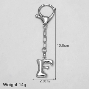 Silver letter F keychain showing dimensions 10cm length and 2cm width for bag accessory