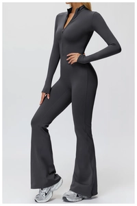 Close-up of slim-fit thermal yoga jumpsuit with half-zip stand collar and thumbhole cuffs