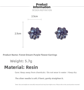 Detail showing forest dreamy purple flower earrings with resin petals and silver needles