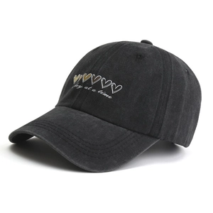 Washed denim baseball cap with One Day at a Time embroidery and five hearts