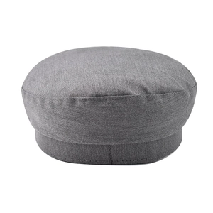 Close-up of the fine twill texture and stitching on the dark grey newsboy cap for women