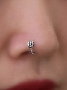 U-shaped non-pierced silver nose clip featuring a micro-set zircon daisy flower design