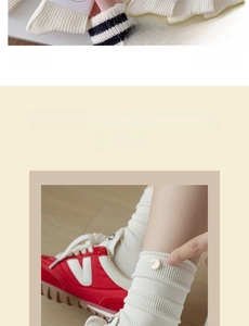 Detail view of cream ribbed mid-calf socks featuring decorative side buttons and cotton fabric
