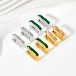 Rectangular huggie earrings with baguette-cut emerald and white zircon in gold and silver finish