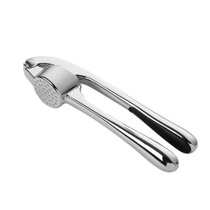 Silver stainless steel garlic press with ergonomic black non-slip handles on white background